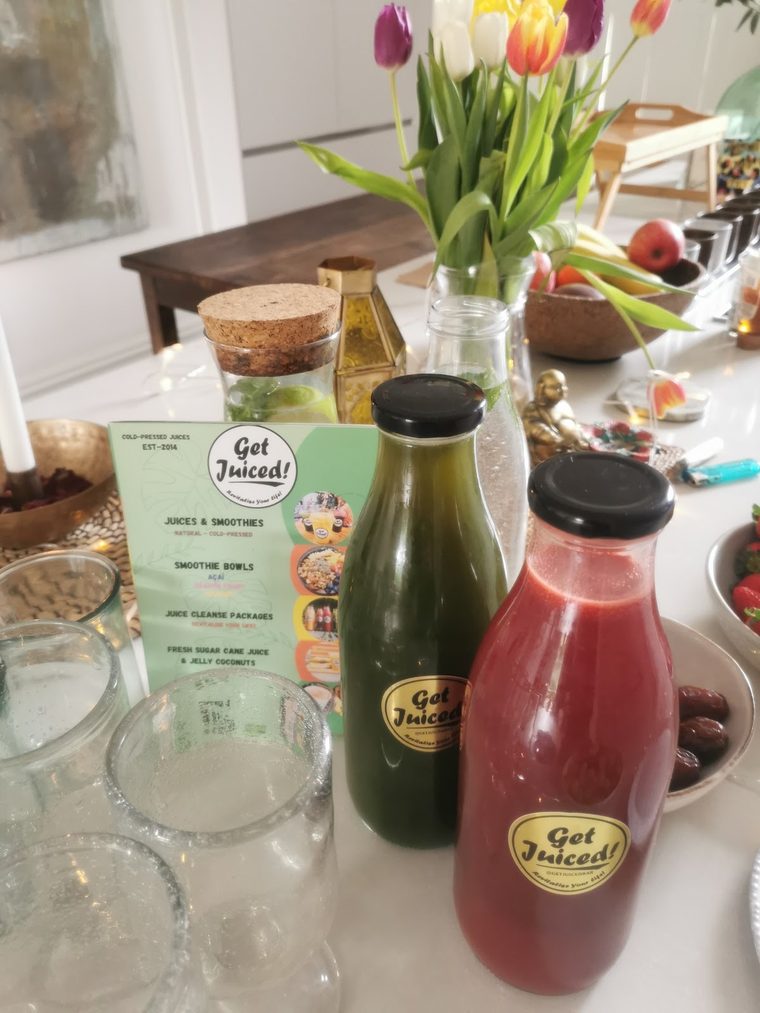 Two bottled juices, one green and one red